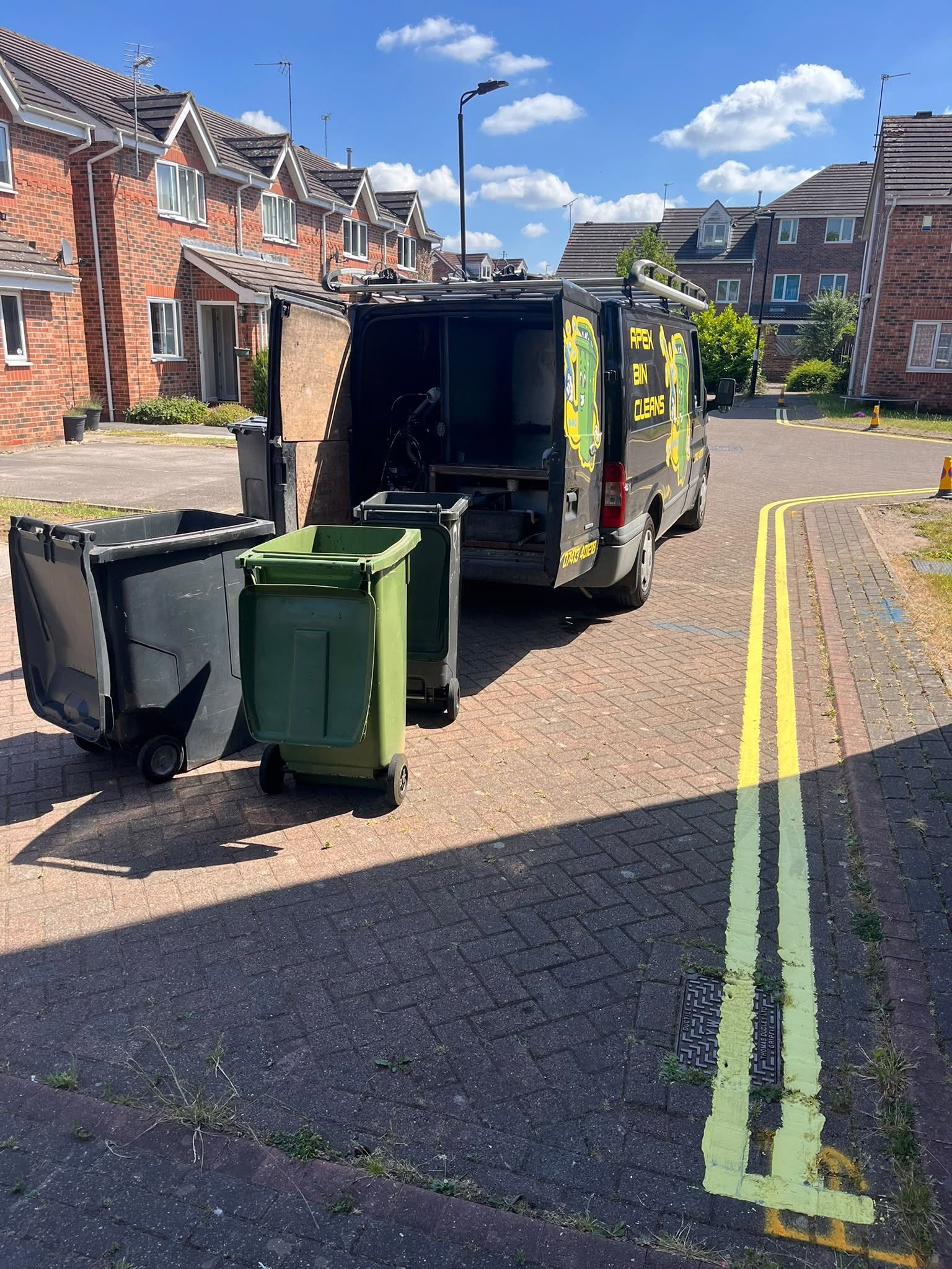 Apex Bin Cleans van on a residential York street with freshly cleaned bins